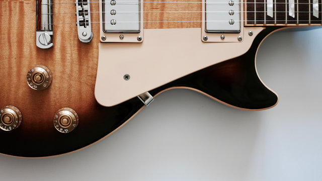 electric guitar. color background . closeup