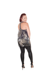 Woman standing from the back, smiling