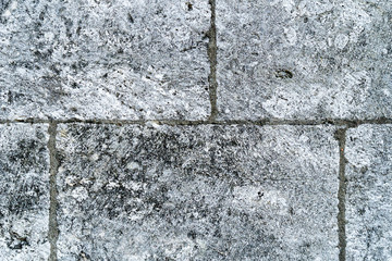 Old, damaged by time, stone wall. Natural background for designers.
