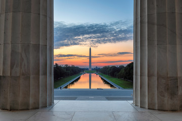 Washington, DC, Washington Monument and Reflecting Pool at sunrise from Lincoln Memorial, USA.