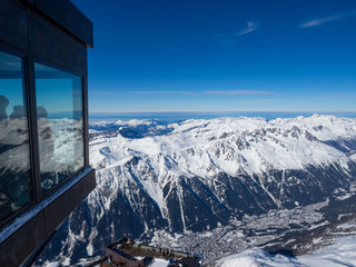 France, january 2018: View on Chamonix Valley from top of Aiguille du Midi summit on a sunny winter day