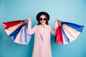 Portrait of cute sweet cheerful girl in eyewear eyeglasses go shopping buy present gifts on her...