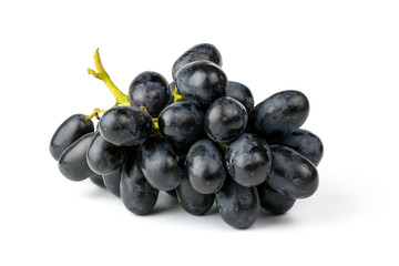 Fresh black grapes isolated on white background.