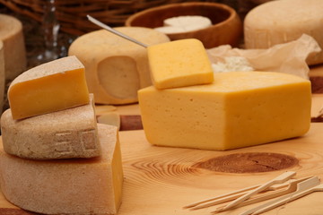 various types of cheese on table