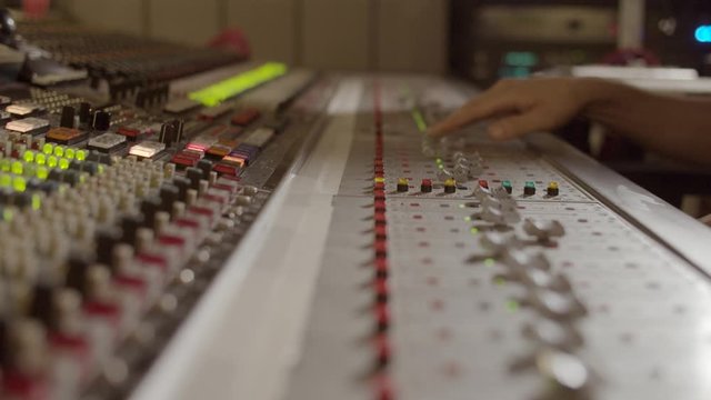 Sound mixer in a recording studio
