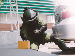Bomb Disposal Expert in Bomb suit for Explosive ordnance disposal