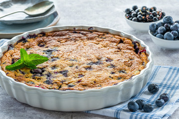 Lemon, blueberry and blackberry clafoutis - delicious baked fruit dessert