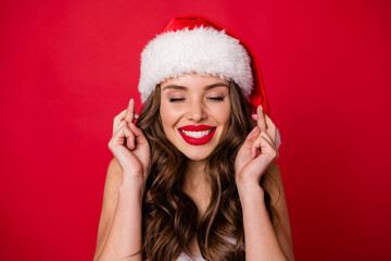 Close up photo of excited woman wait for wish her eyes closed having long wavy hairstyle wearing...