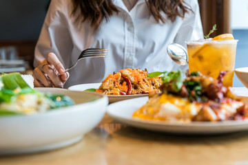 Young  Asian woman having a breakfast