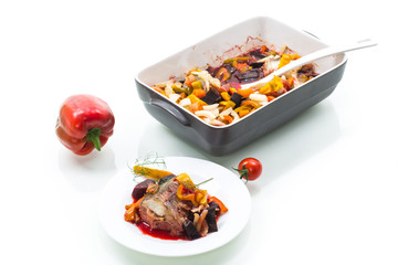 fish stew with beets and other vegetables in a plate