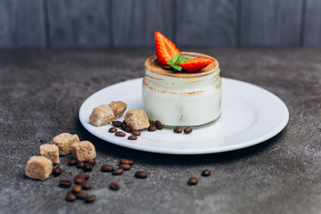 Panakota fresh cream dessert with strawberries and chocolate.