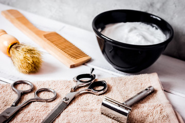 Mens hairdressing wooden desktop with tools for shaving