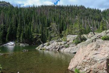 Fototapeta na wymiar Rocky Mountain National Park landscape of Dream Lake, rock formations and trees