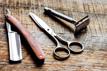 Tools for cutting beard barbershop on wooden background