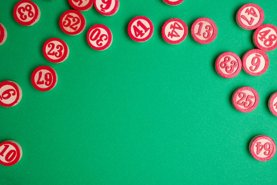 bingo numbers on green background - flat lay style