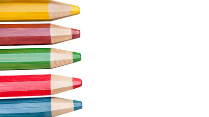 large colored pencils on a concrete background,copy space