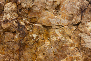 oragne stone cracks caused by natural erosion,natural background