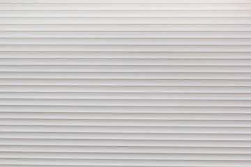 Obraz premium Closed white plastic blinds texture