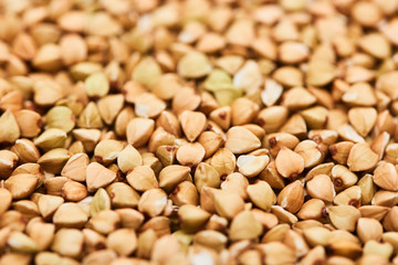 close up view of uncooked organic whole buckwheat