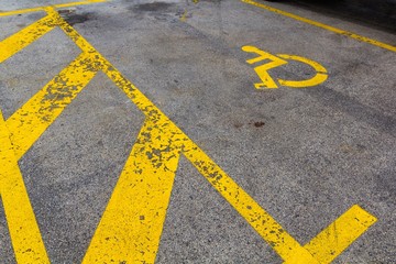 Painted disabled people parking sign