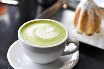 green tea or matcha green tea and pandoro cake