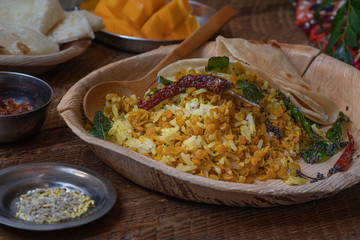 Indian Rice and Lentils Served in Traditional Wooden Bowl