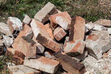Group of Old Damaged Destroyed Thrown Away Red Bricks