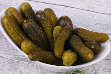 Pickled cucumbers heap in the bowl