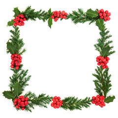 Winter and christmas square wreath with holly and juniper leaf sprigs on white background with copy space.