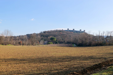 Panoramic view to medieval castle Monteriggioni on the tuscany hill