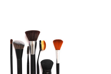 makeup brushes on white background beauty concept, self care, cosmetics store copyscape