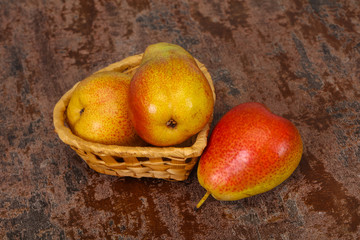 Pear heap in the wooden basket
