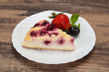 Cheesecake with cherry served strawberry