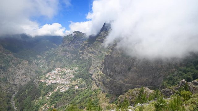 Clouds over the mountains on Madeira island at the Curral das Freiras or Valley of the Nuns Time-lapse clip.