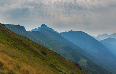 Tourists walking along the ridges of the mountains in the Tatras