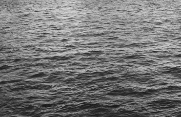 Water surface abstract simple background of black and white color. Calm water image with monochrome view and empty copy space 