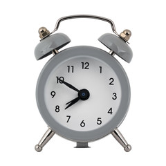 A gray clock with an alarm clock on a white background with arrows showing the time seven hours and fifty minutes or nineteen hours and fifty minutes
