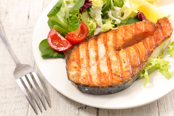 grilled salmon steak with salad