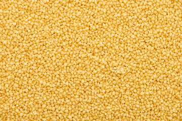 top view of raw organic couscous groat