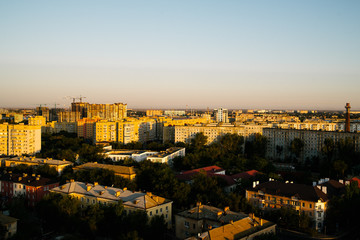 Obraz premium Dawn over the city in the summer in Russia. Cityscape in Russia.Aerial view