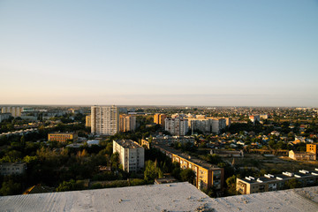 Fototapeta na wymiar Dawn over the city in the summer in Russia. Cityscape in Russia.Aerial view