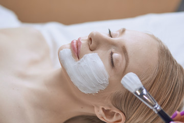 people, beauty, cosmetology and treatment concept - close up of