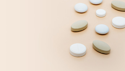 Various pharmaceutical medicine pills and tablets close-up on a soft beige background. Healthcare and pharmaceuticals. Pills background, copy space.