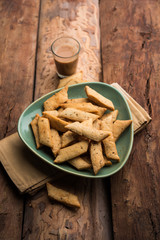 Namakpare or Salty Shakarpara/shakarpare or namkeen Shankarpali, popular diwali food or tea-time snack from Gujarat, India