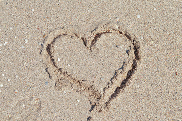  hearts on the sand near the sea