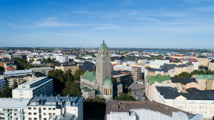 Part of Helsinki city , Kallio church tower in middle. Beautiful summer day, blue sky and clouds
