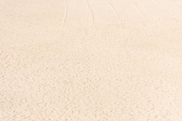 View of sand at a beach by the sea