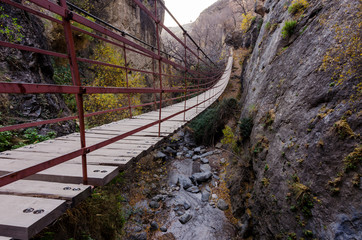 Hiking trail Los Cahorros de Monachil (Granada) in Autumn. Impressive gorge carved by the Monachil River. It is a place of singular beauty with waterfalls, caves and suspension bridges.