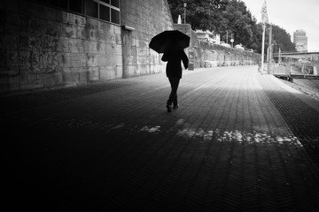 woman with umbrella in the rain