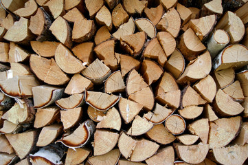 a wall of stacked wood